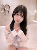 何かを